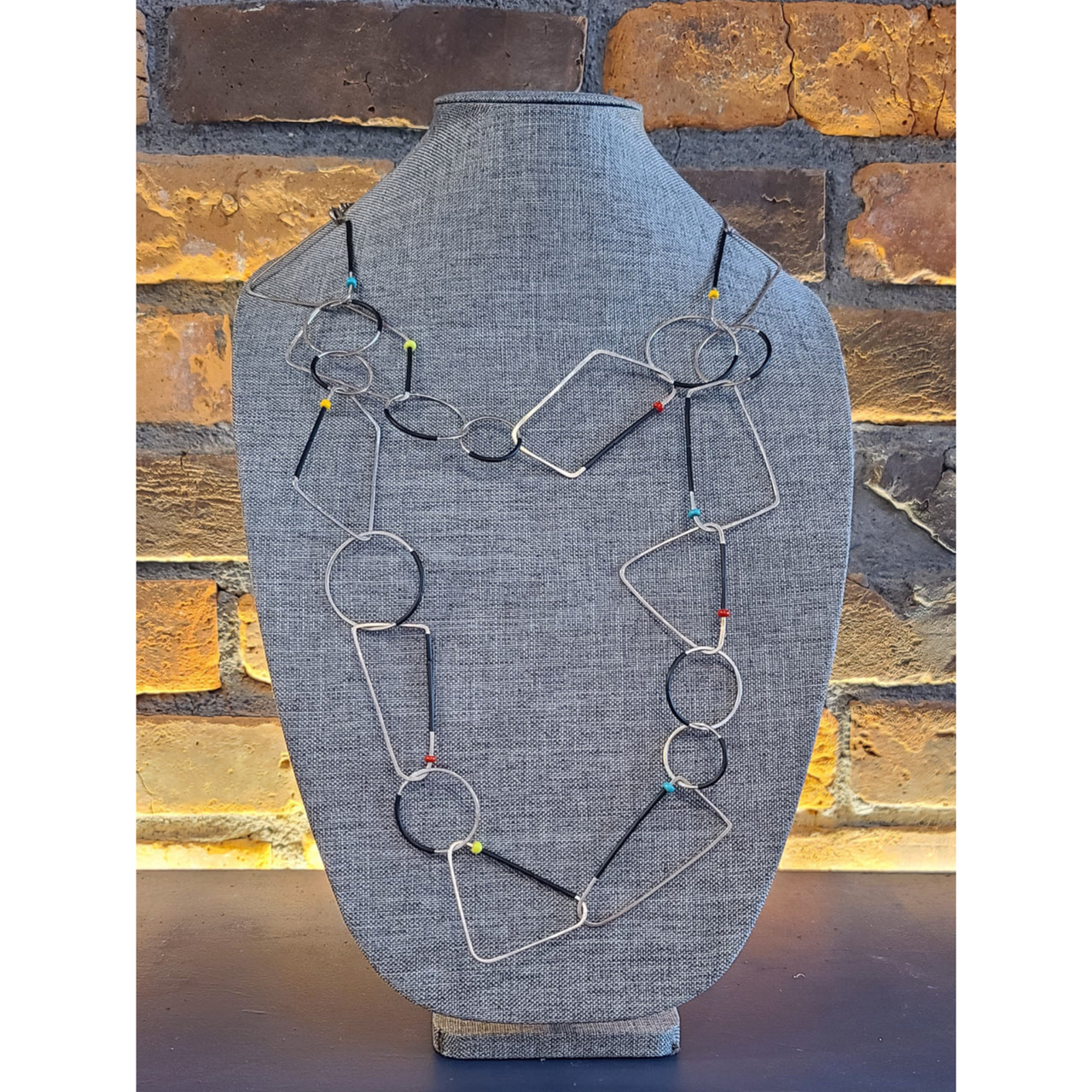 Inteplei: Dot Shaped Links Necklace